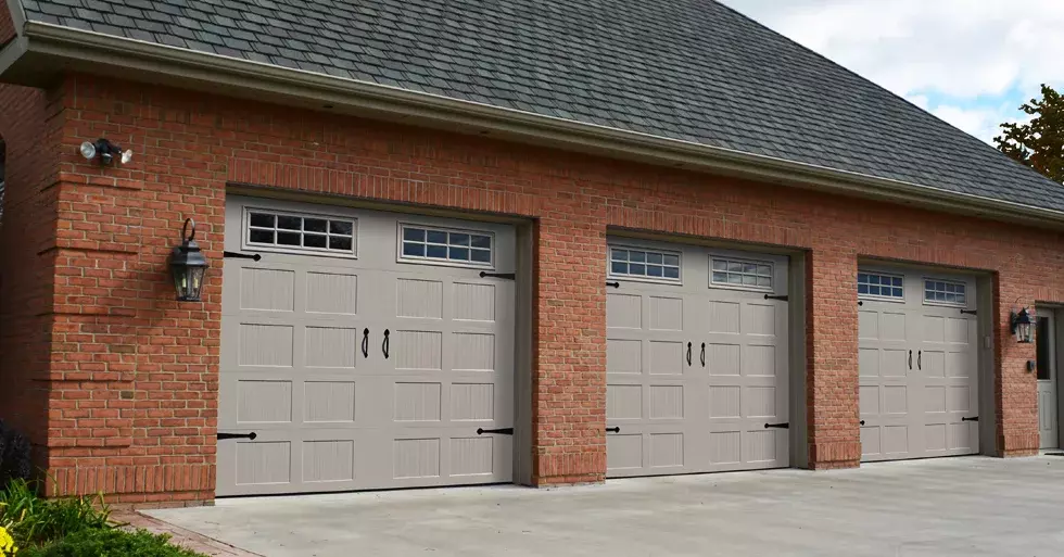 home with gray advantage estate carriage house garage door
